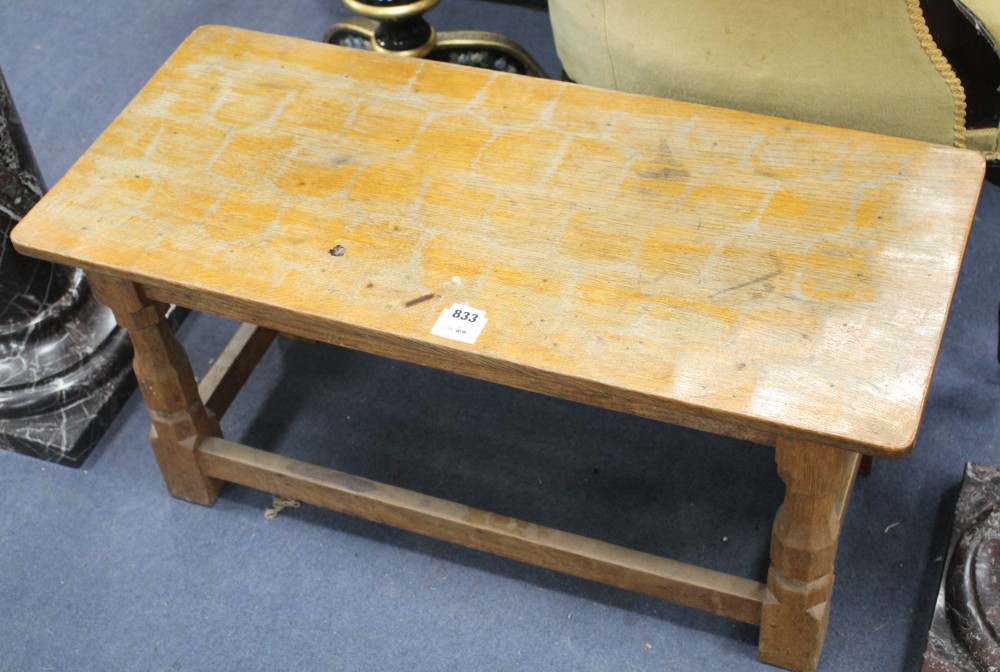 A Robert Thompson Mouseman carved oak low table, with mouse to one leg, W.83cm D.37cm H.39.5cm